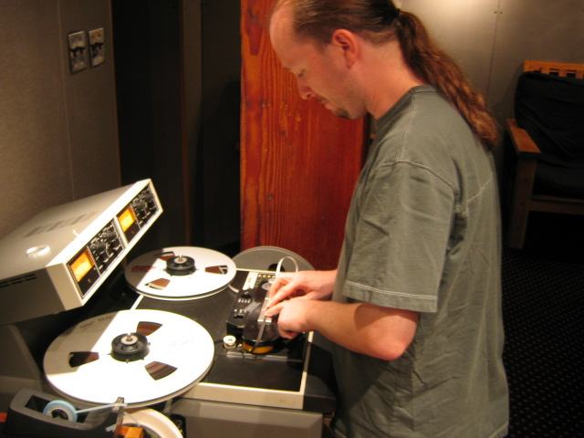 Chris Garges splicing 2-track tape on an ATR machine
